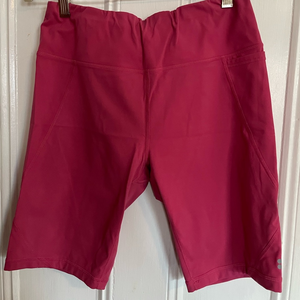 Sweaty Betty power bike shorts, pink, size Large